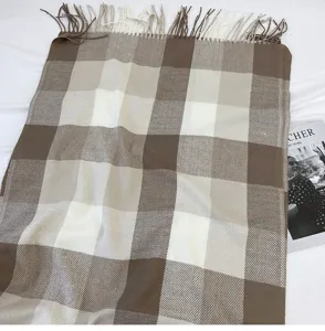 Cozy brown and white plaid tassel scarf for women and men, soft winter cashmere-feel shawl.