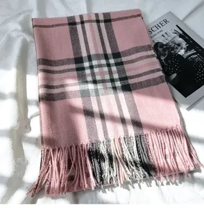 Pink plaid scarf detail with soft imitation cashmere texture and elegant winter fringe tassels.