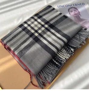 Soft cashmere-feel winter plaid scarf with fringe, stylish grey and black British design shawl.