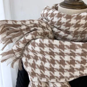 Classic brown and white houndstooth winter scarf with cozy tassels for women warmth.