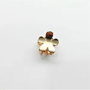 Golden metallic mini flower hair claw clip, cute hair accessory for daily styling and chic look.