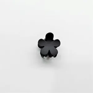Black mini flower hair claw clip, cute matte hair accessory for daily styling and hair.