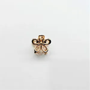 Gold metal mini flower hair claw clip cute small hair accessory for styling and daily wear