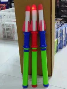 LED light up hand push rocket launcher toy for outdoor park fun play and nighttime glowing entertainment