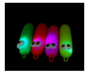 Light up flashing caterpillar squeeze toy with bulging eyes, fun sensory stress relief toy for kids.