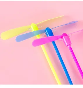 Colorful plastic bamboo dragonfly flying toy, hand push flashing rotating novelty kids gift.
