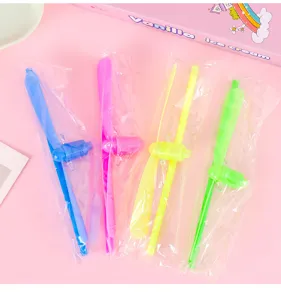 Colorful flashing bamboo dragonfly flying toys set with pull strings for kids party outdoor fun.