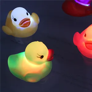 LED light up rubber duck toy for baby bath time, glowing floating duck for water fun.