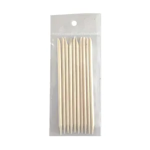 Wooden nail cuticle pusher sticks set in clear bag, pointed and flat dual head design.