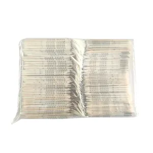 Packaged orange wood sticks for nail art with dual-ended pointed and flat design.
