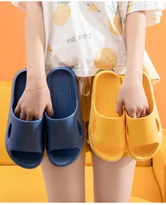 Lightweight EVA house slippers with anti-slip sole and soft comfortable texture for indoor wear.