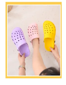 Nahaufnahme Detailansicht von leichten EVA atmungsaktiven Clogs in Lila, Rosa und Gelb.