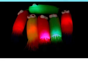 Flashing sensory caterpillar toy detail, soft rubber stress relief fidget toy with glowing LED lights.