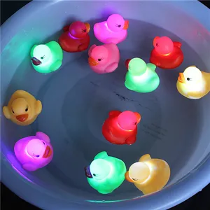 Colorful LED floating glow ducks for baby bath fun, water-activated flashing bath toy set.