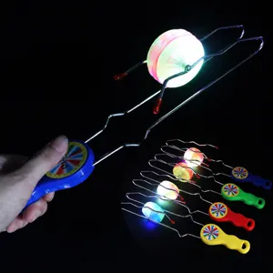 Magnetic swing track yo-yo toy with colorful handles and flashing lights for kids play.