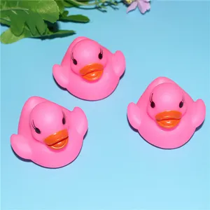 Cute pink floating rubber ducks, LED flashing bath toys for babies and kids water play.