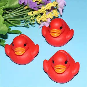 Detailed view of red LED flashing floating bath duck toy, perfect water sensor kids shower toy.