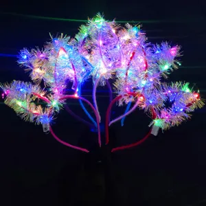 LED glowing tinsel rabbit ear headband detail showing bright colorful party lights.