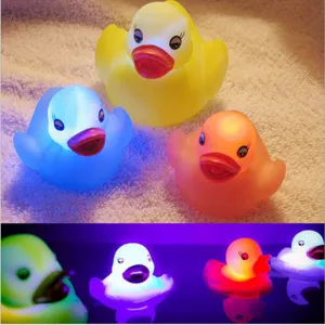 LED light up rubber ducks for baby bath time, water sensing glowing floating duck toys.