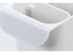 Minimalist white plastic desktop organizer detail, multi-functional small item storage box.