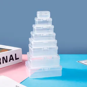 Detail view of clear plastic storage boxes in stacked sizes, perfect for small parts.