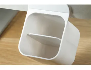 Close-up detail of the white plastic hanging desk storage container showing its internal divider.
