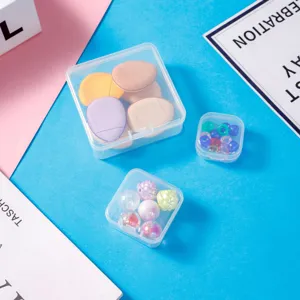 Clear square plastic storage box organizer set for jewelry, crafts, and makeup sponges.