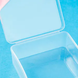 Clear plastic storage box detail, ideal for small parts, jewelry, and accessories organization.