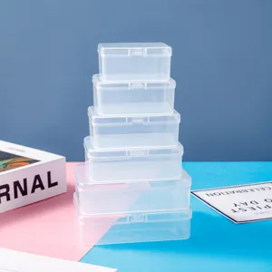 Clear plastic storage box detail showing transparent stackable containers for small parts jewelry.