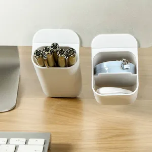 White adhesive desk organizer pen holder for office desktop storage and small stationery items.