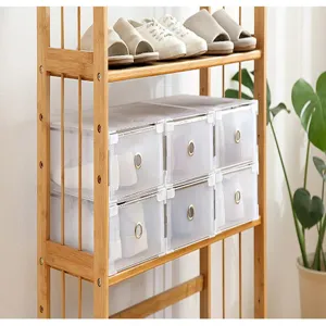 Clear plastic stackable shoe storage boxes detail view, ideal for home organization and shoe rack.
