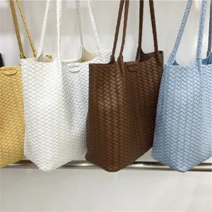 Stylish woven tote shoulder bag for women, large capacity casual daily design handbag.