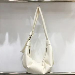 Soft leather slouchy dumpling shoulder bag, casual hobo purse with knot strap detail.