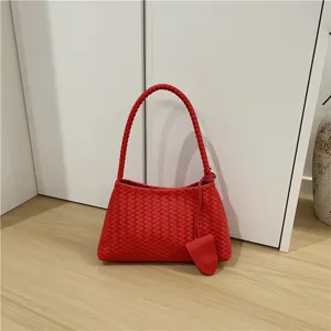 Red woven shoulder bag chic baguette handbag stylish underarm purse for daily use.
