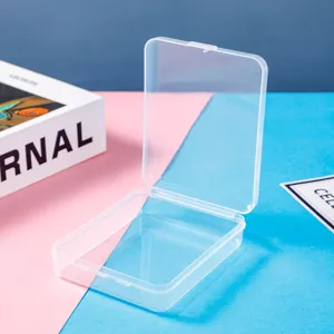 Transparent plastic storage box detail view, empty open container for small items use.