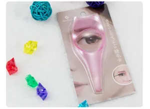 Detail view of the pink plastic eyelash card, a practical makeup helper tool for beginners.