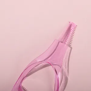 Pink translucent plastic eyelash guard makeup tool eye baffle beginner beauty accessory.