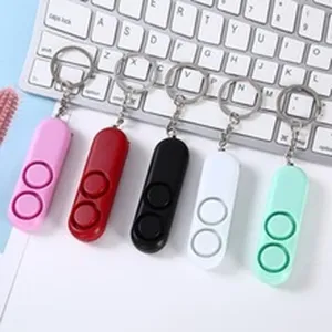 Draagbare persoonlijke veiligheidsalarm sleutelhanger met LED, kleurrijk mini apparaat.