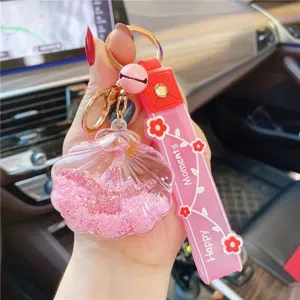 Süßer rosa Muschel Glitzer Schlüsselanhänger mit Band, perfekter Anhänger für Rucksack.