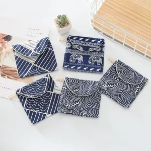 Linda bolsa higiénica de algodón y lino, mini monedero portátil, diseño de estampado azul.