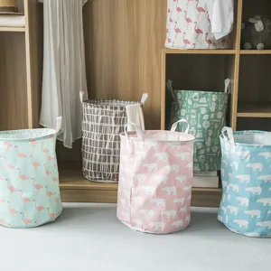 Katoen linnen opbergmand wasmand met schattige cartoonprints voor thuisorganisatie.
