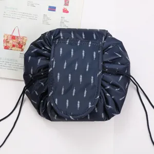Large capacity lazy cosmetic bag waterproof travel makeup storage pouch with drawstring design.