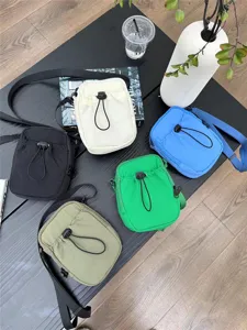 Japanese minimalist nylon crossbody bag, lightweight casual mobile phone shoulder bag for men and women.