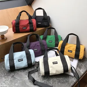 Casual nylon barrel bag for women, multi-color lightweight oxford cloth shoulder handbag.