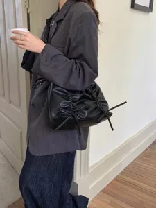 Chique schoudertas met strik voor dames, stijlvolle kunstlederen hobo tas met uniek design.