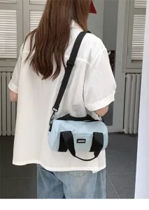 Casual lightweight blue cylindrical shoulder bag, versatile oxford cloth crossbody barrel bag.