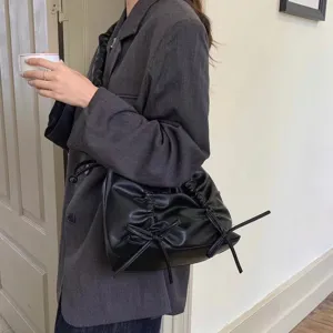 Niche ontwerp strik schoudertas voor vrouwen, mode veelzijdige crossbody tas voor dagelijks.