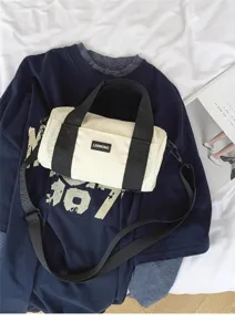 Casual lightweight oxford cloth cylinder shoulder bag, daily commuting crossbody bag for women.