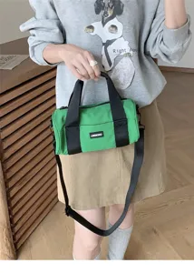 Casual green canvas cylindrical shoulder bag, stylish daily commuting crossbody handbag for women.