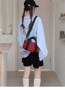 Casual red oxford cloth cylindrical shoulder bag for women, versatile lightweight commuter handbag.